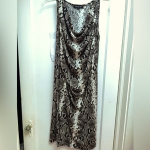 Sleeveless snake print dress with soft draped neckline